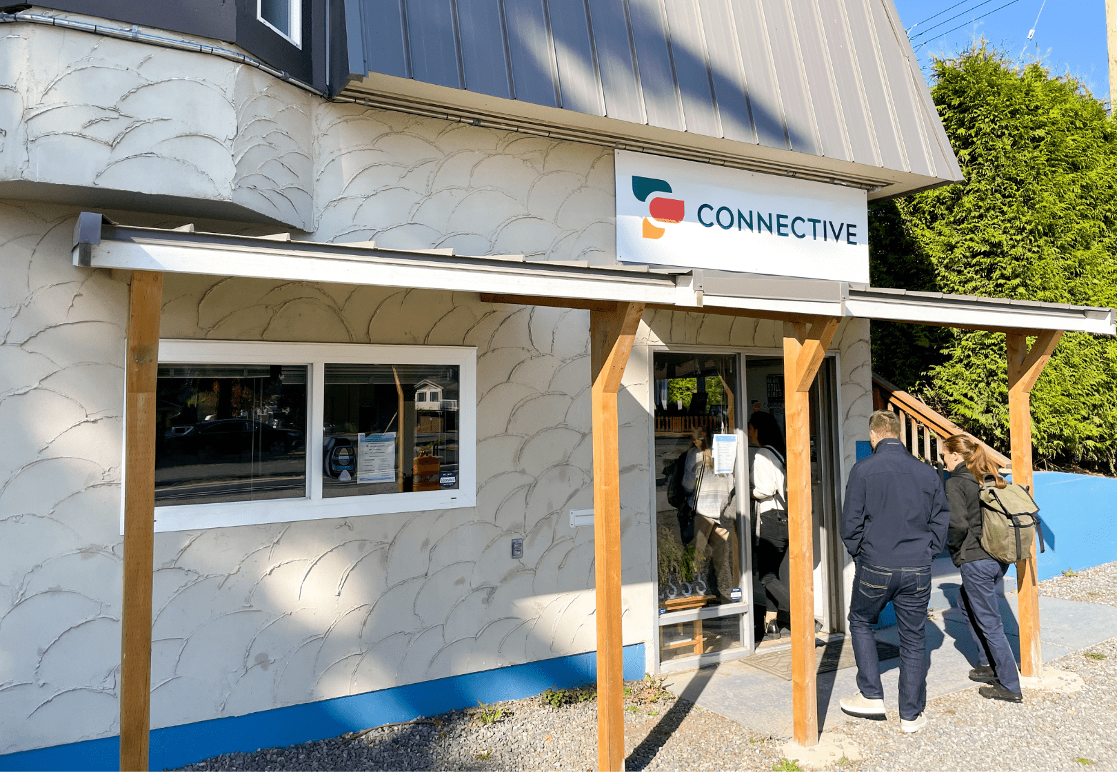 staff walking into Connective building