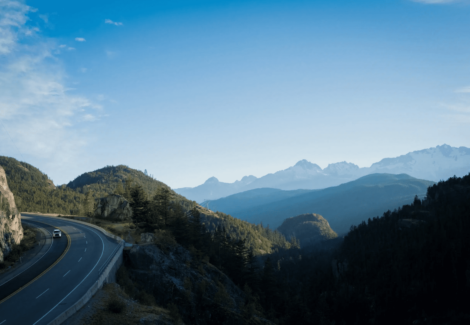 Mountainous landscape in BC with road through it