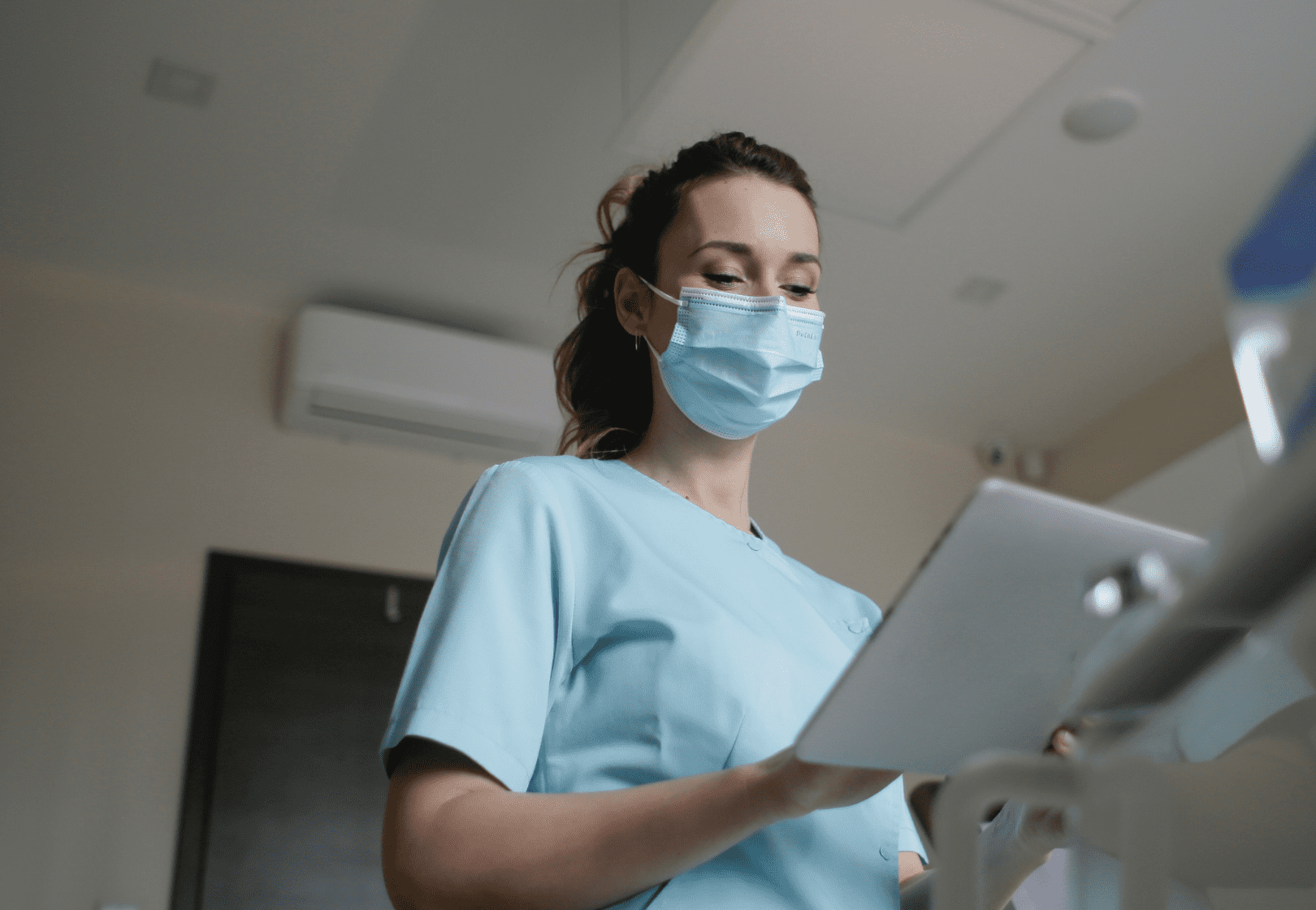 Healthcare worker using a tablet