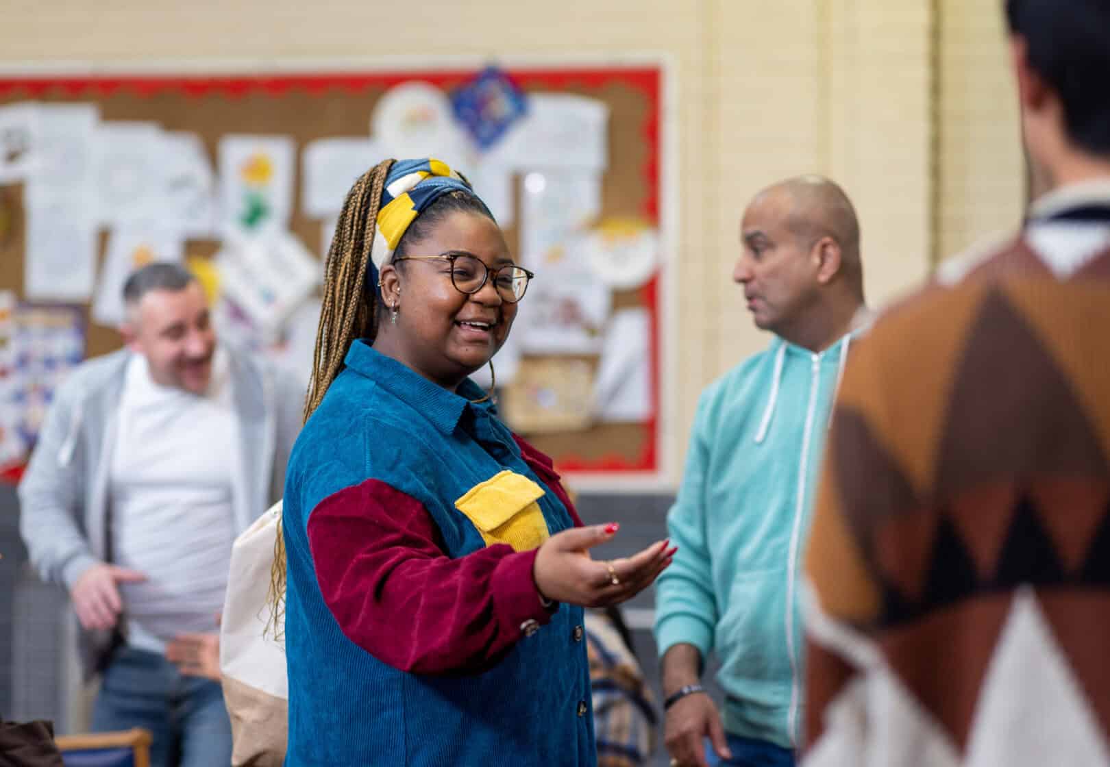 Woman greeting people