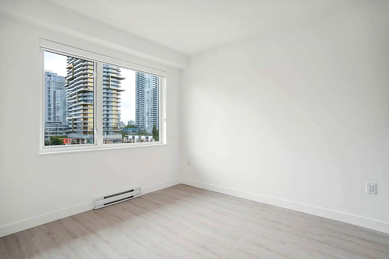 Empty bedroom with views of downtown Burnaby